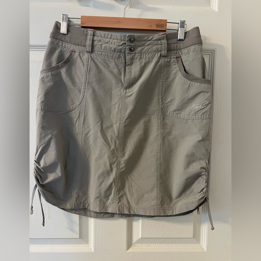 Kuhl Tan/Khaki Skirt with Drawstring Hem and adjustable sides Size 10